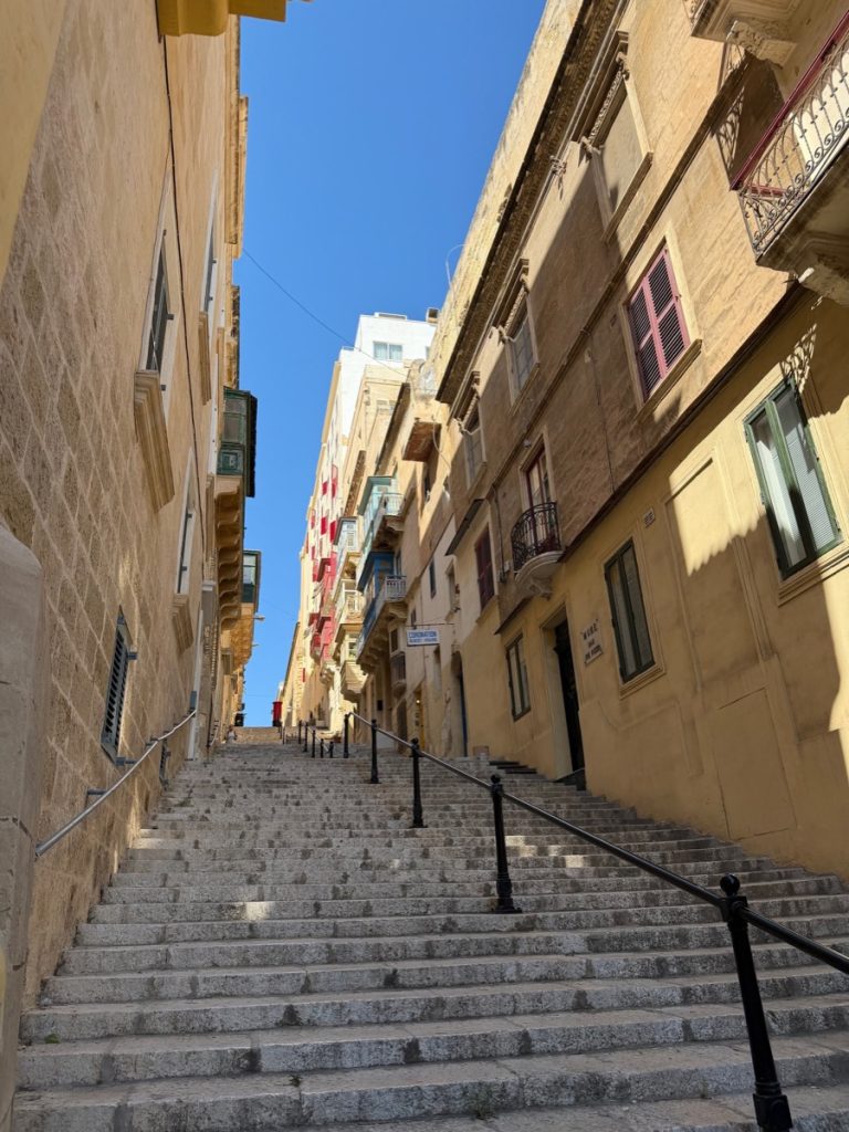 Stone stairs and historic buildings in Valletta, Malta