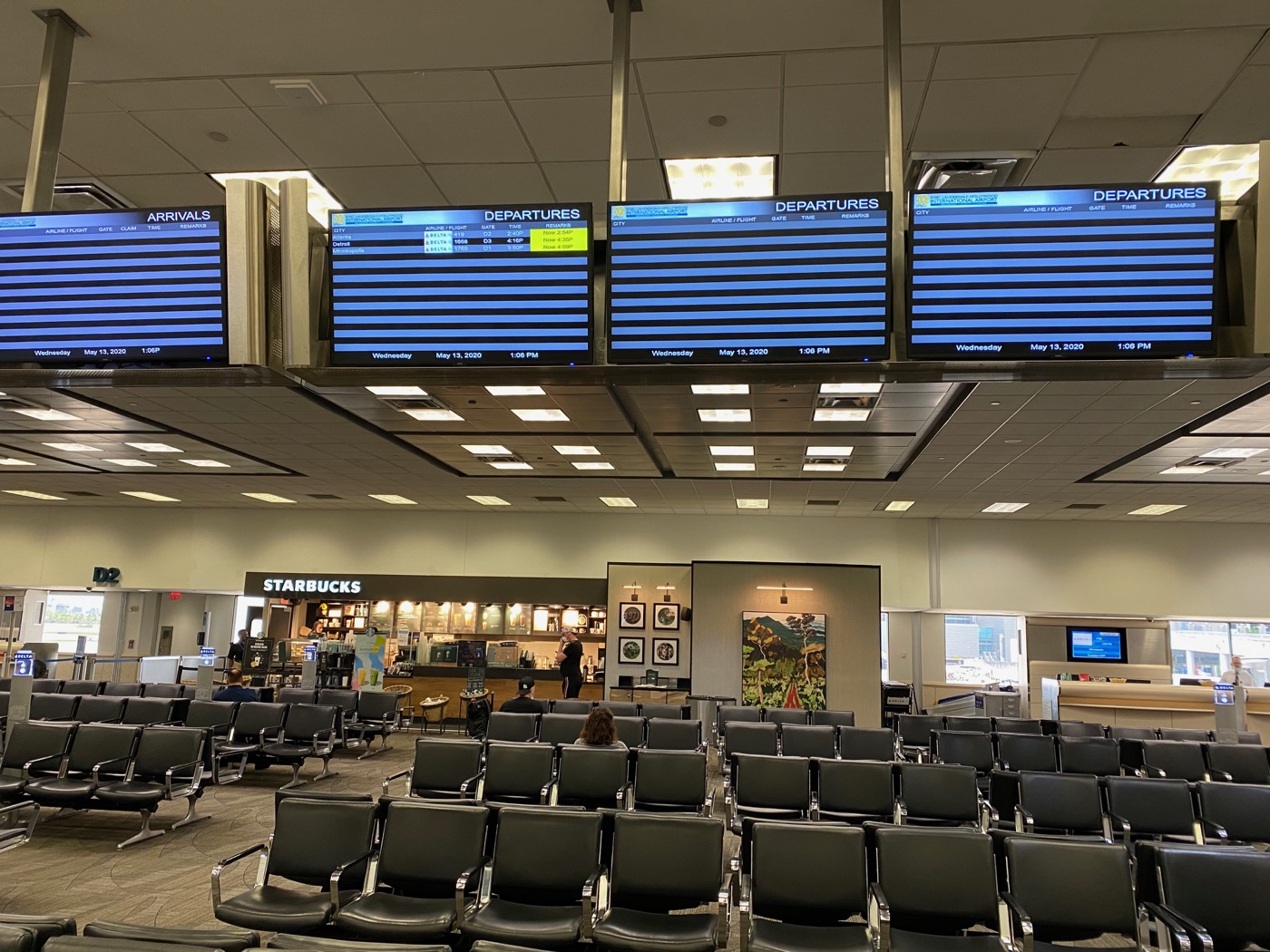 Airport departure board with very few flights