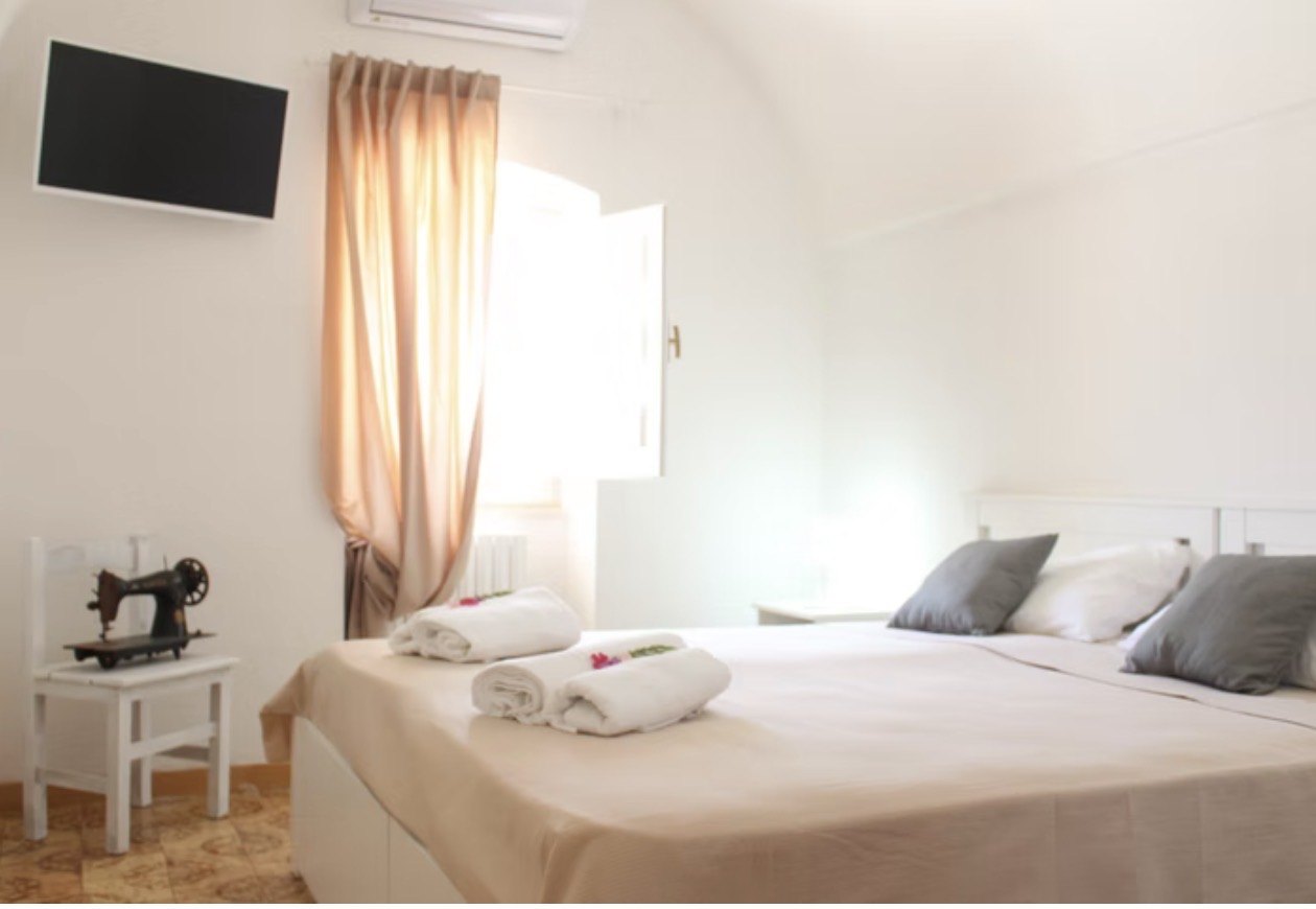 Private room with double bed at the writing retreat villa